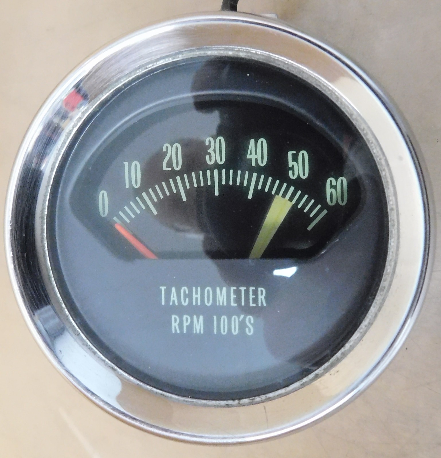 GM OEM Chevy Chevelle “Knee Knocker” Tach, W/5,000 RPM, 3.750″ Dia, Chrome Mtg