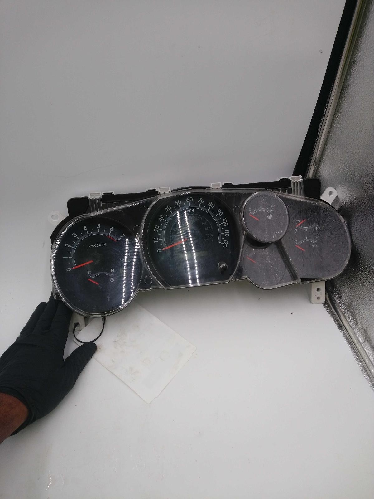 Used Speedometer Gauge fits: 2010 Toyota Tundra cluster MPH 8 cylinder w/tow pac